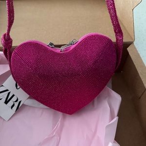 Zara pink rhinestone heart shaped bag.